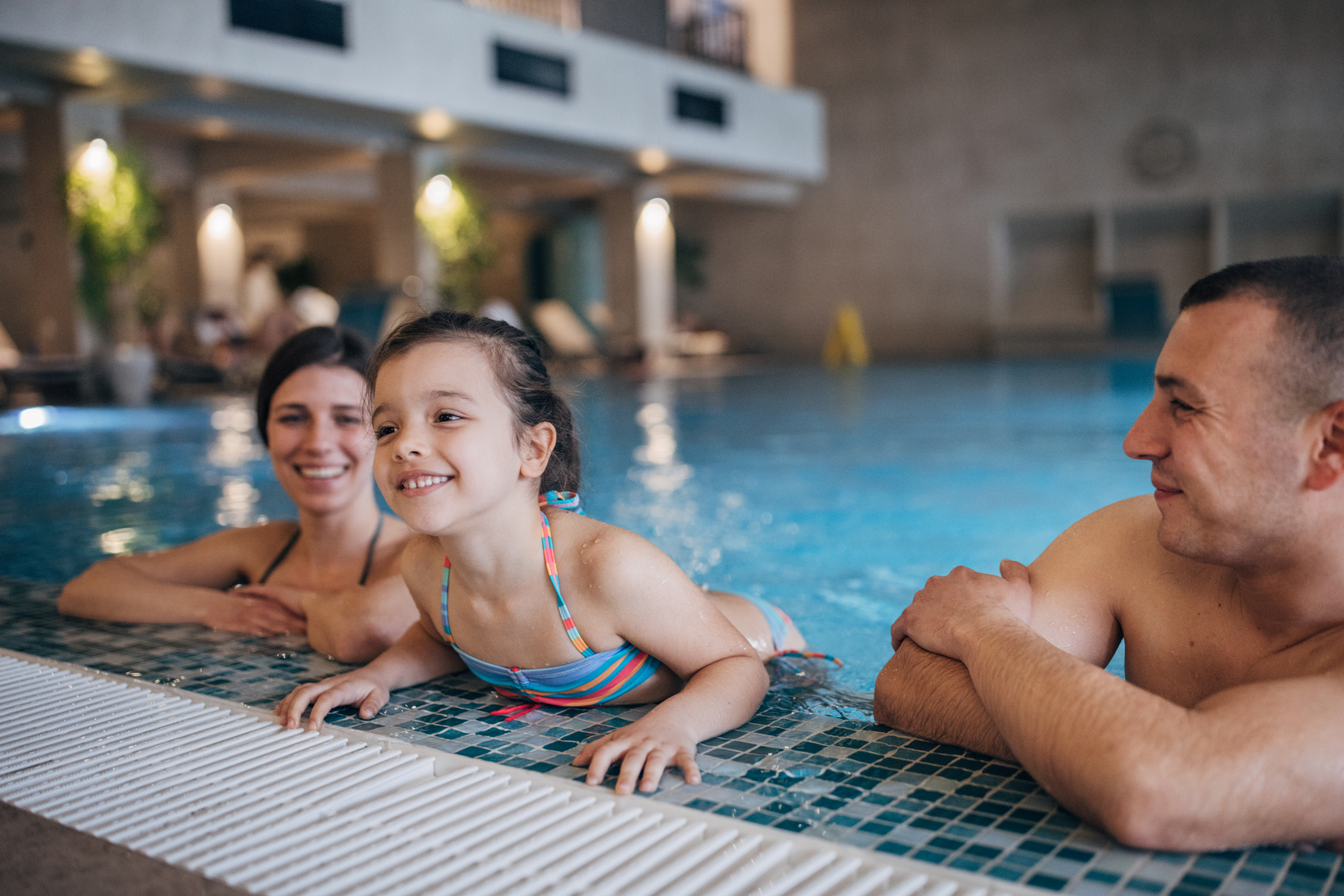 Family in hotel pool